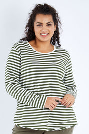 Model Sasha-Lee wearing size 16 of The Relaxed Cotton Long Sleeve Tee in colour Khaki (Green), from the front, cropped image
