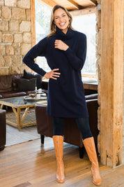 Model Amanda wearing size S of The Roll Neck Tunic Dress in colour Navy (Blue), from the front, showing the whole outfit