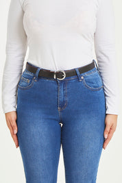 A model wearing size S of The Bella Genuine Reversible Leather Belt in colour Tan, from the front, cropped image