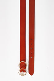 A model wearing size S of The Townsville Genuine Leather Belt in colour Tan, from the front, showing the whole outfit