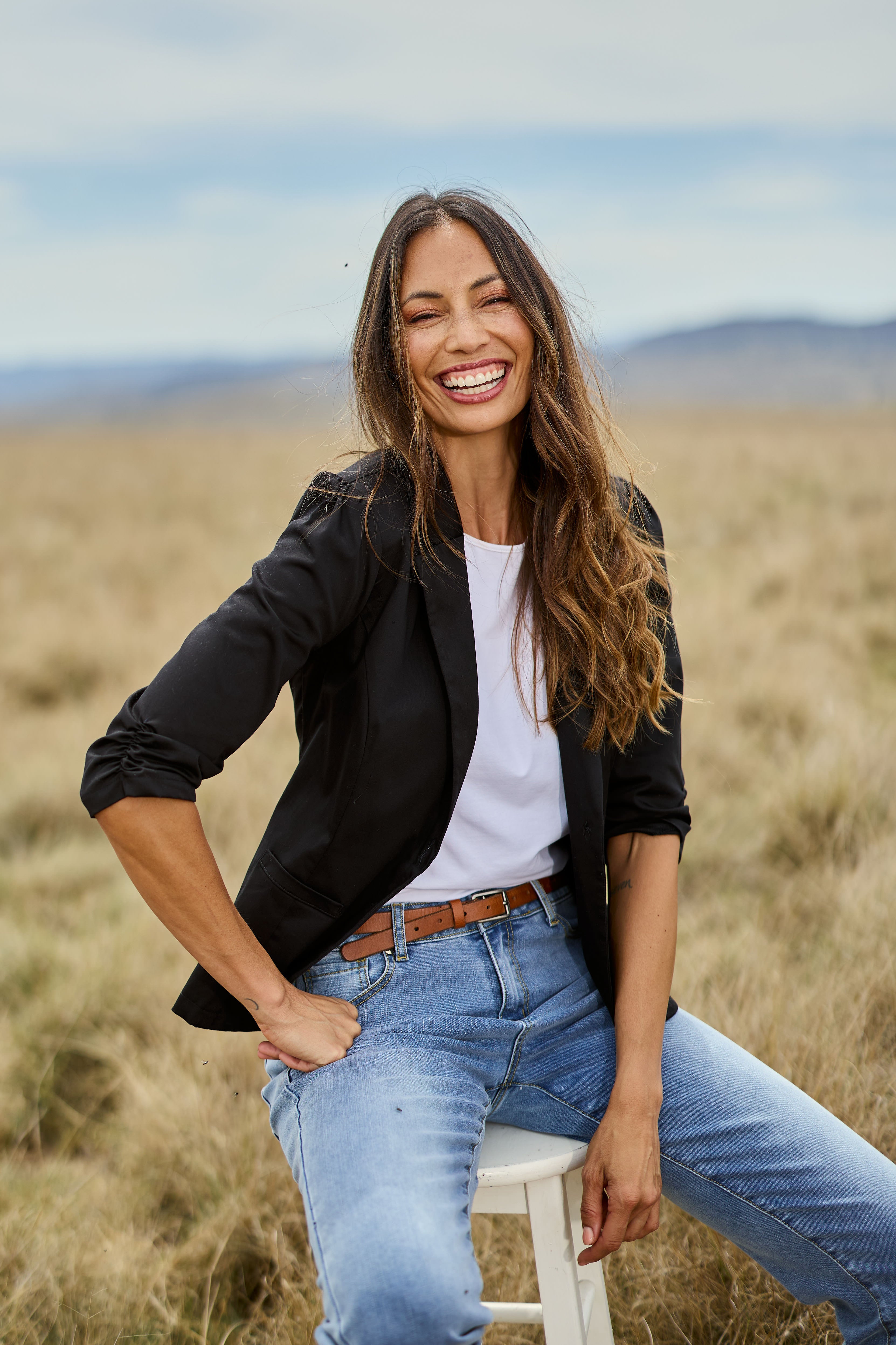 Model Amanda wearing size 10 of The Everyday Blazer in colour Black (Black), from the front, showing the whole outfit