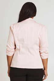 Model Ashleigh wearing size 16 of The Everyday Blazer in colour Blush (Pink), from the front, showing the whole outfit