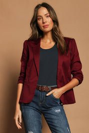Model Madeline wearing size 10 of The Everyday Blazer in colour Chillired (Red), from the front, cropped image