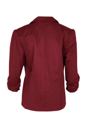 Product shot of The Everyday Blazer in colour Chillired (Red), from the back