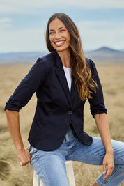 Model Amanda wearing size 10 of The Everyday Blazer in colour DarkNavy (Blue), from the front, showing the whole outfit