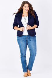 Model Mae wearing size 16 of The Everyday Blazer in colour DarkNavy (Blue), from the front, showing the whole outfit