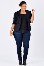 Model Shareefa wearing size 18 of The Everyday Blazer in colour DarkNavy (Blue), from the front, showing the whole outfit