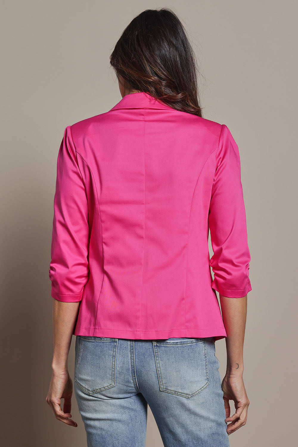 Model Amanda wearing size 10 of The Everyday Blazer in colour Fuschia (Pink), from the back