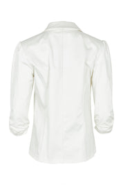Product shot of The Everyday Blazer in colour Ivory (White), from the back
