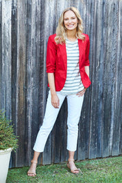 Model Alex wearing size 8 of The Everyday Blazer in colour Red (Red), from the front, showing the whole outfit