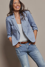 Model Abby wearing size 10 of The Everyday Blazer in colour Softblue (Blue), from the front, cropped image