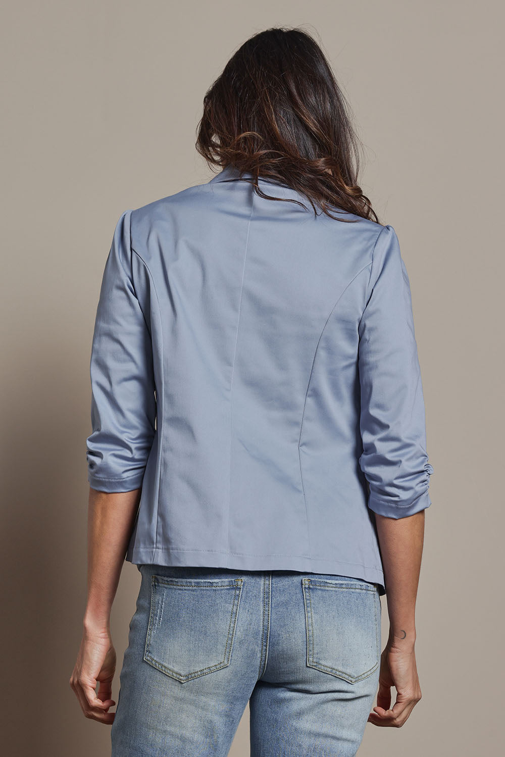Model Amanda wearing size 10 of The Everyday Blazer in colour Softblue (Blue), from the back