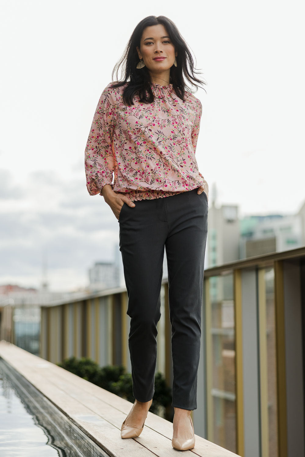 Model Miranda wearing size 10 of The Slim Cut Stretch Pant in colour Charcoal (Grey), from the front, showing the whole outfit