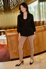 Model Miranda wearing size 10 of The Slim Cut Stretch Pant in colour Hurricane, from the front, showing the whole outfit