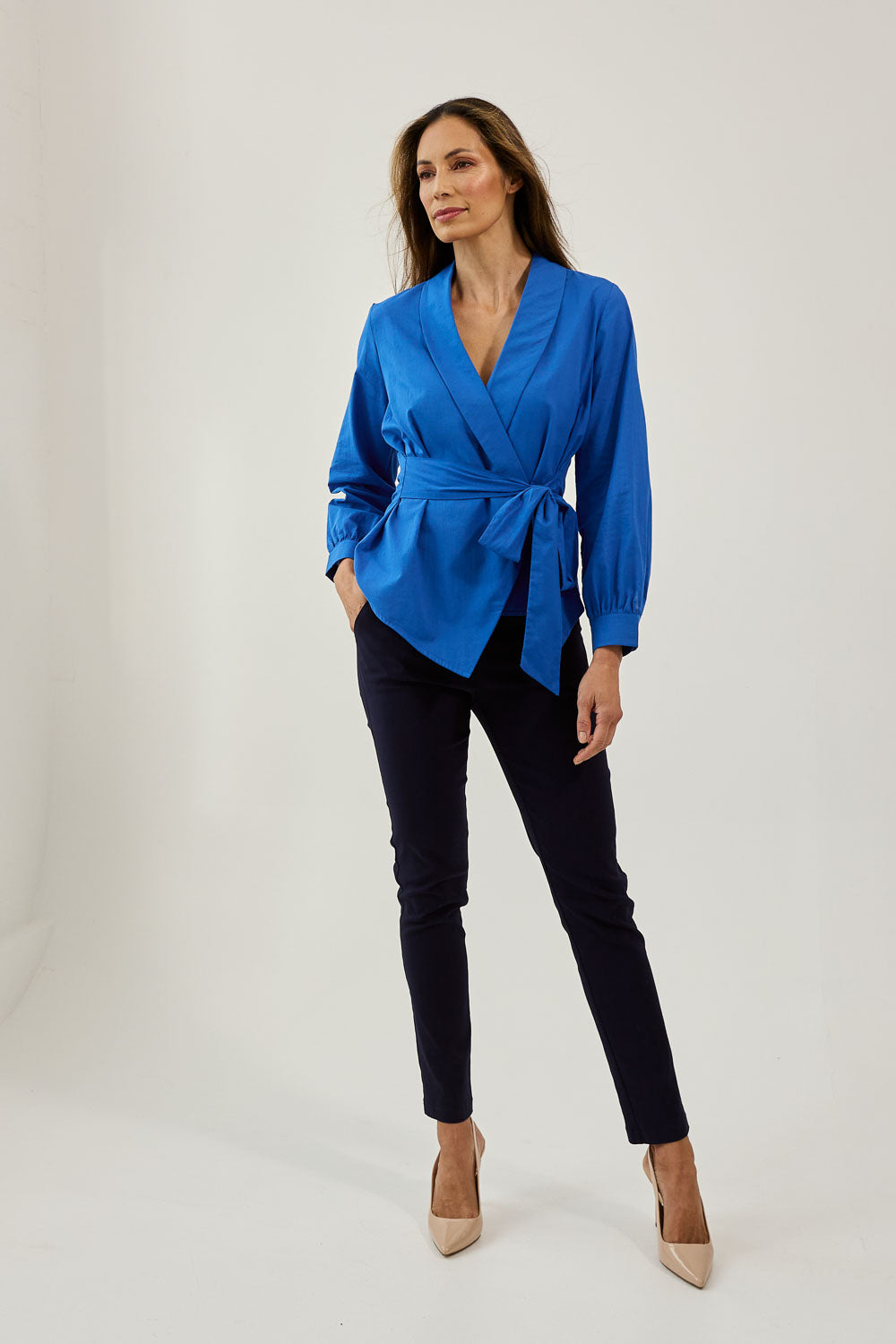 Model Amanda wearing size 10 of The Slim Cut Stretch Pant in colour Navy (Blue), from the front, showing the whole outfit