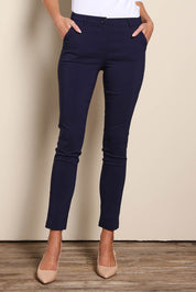 Model Madelinec wearing size 10 of the The Slim Cut Stretch Pant - Navy in colour Navy, from the front