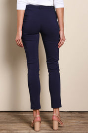 Model Madelinec wearing size 10 of the The Slim Cut Stretch Pant - Navy in colour Navy, from the front