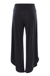 Product shot of The Cross Over Pant in colour Graphite (Grey), from the back