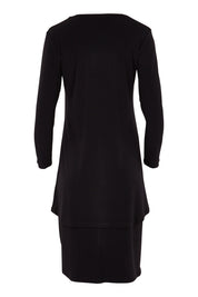 Product shot of The Long Rita Dress in colour Black (Black), from the back