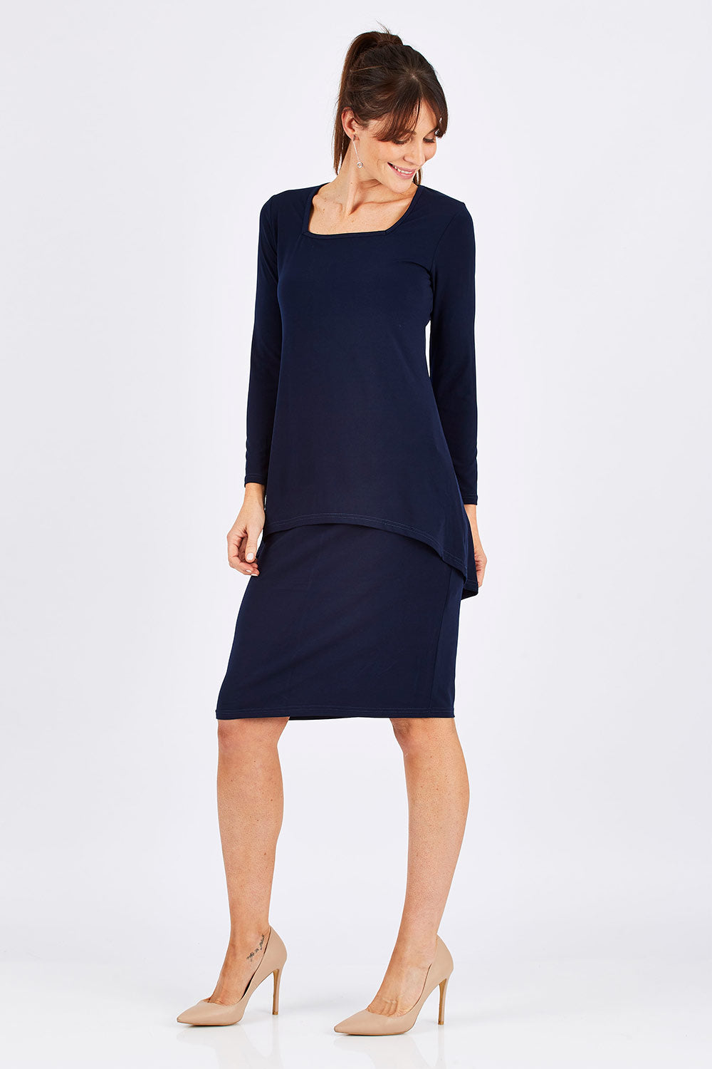 Model Monique wearing size 10 of The Long Rita Dress in colour Navy (Blue), from the front, showing the whole outfit