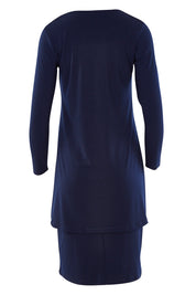Product shot of The Long Rita Dress in colour Navy (Blue), from the back