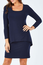 Model Abby wearing size 14 of The Rita Dress in colour Navy (Blue), from the front, cropped image