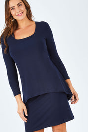 Model Abby wearing size 14 of The Rita Dress in colour Navy (Blue), from the front, cropped image