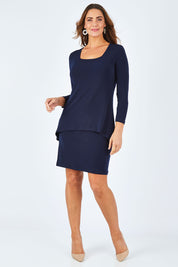 Model Abby wearing size 14 of The Rita Dress in colour Navy (Blue), from the front, showing the whole outfit