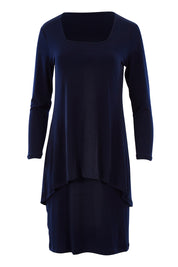 Product shot of The Rita Dress in colour Navy (Blue), from the front