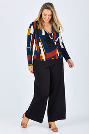 Model Jess wearing size 14 of The Wide Leg Ponte Pant in colour Black (Black), from the front, showing the whole outfit