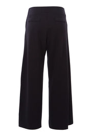 Product shot of The Wide Leg Ponte Pant in colour Black (Black), from the back