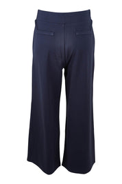 Product shot of The Wide Leg Ponte Pant in colour Darknavy (Blue), from the back