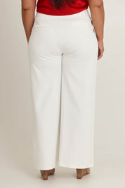 Model Ashleigh wearing size 16 of The Wide Leg Ponte Pant in colour Pearl (White), from the back