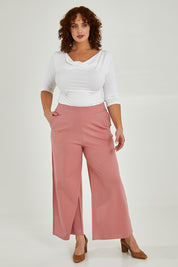 Model Maddy wearing size 16 of The Wide Leg Ponte Pant in colour Rose (Pink), from the front, showing the whole outfit
