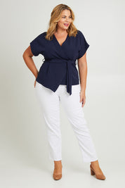 Model Fiona wearing size 16 of The Kimono Top in colour Navy (Blue), from the front, showing the whole outfit