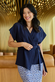 Model Miranda wearing size 10 of The Kimono Top in colour Navy (Blue), from the front, showing the whole outfit