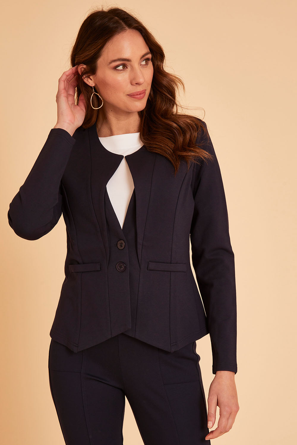 Model Madeline wearing size 10 of The Define Ponte Jacket in colour Darknavy (Blue), from the front, cropped image