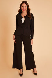 Model Madeline wearing size 10 of The Define Ponte Jacket in colour Jetblack (Black), from the front, showing the whole outfit