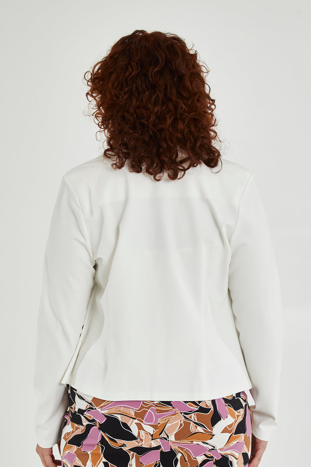 Model Maddy wearing size 16 of The Define Ponte Jacket in colour Pearl (White), from the back