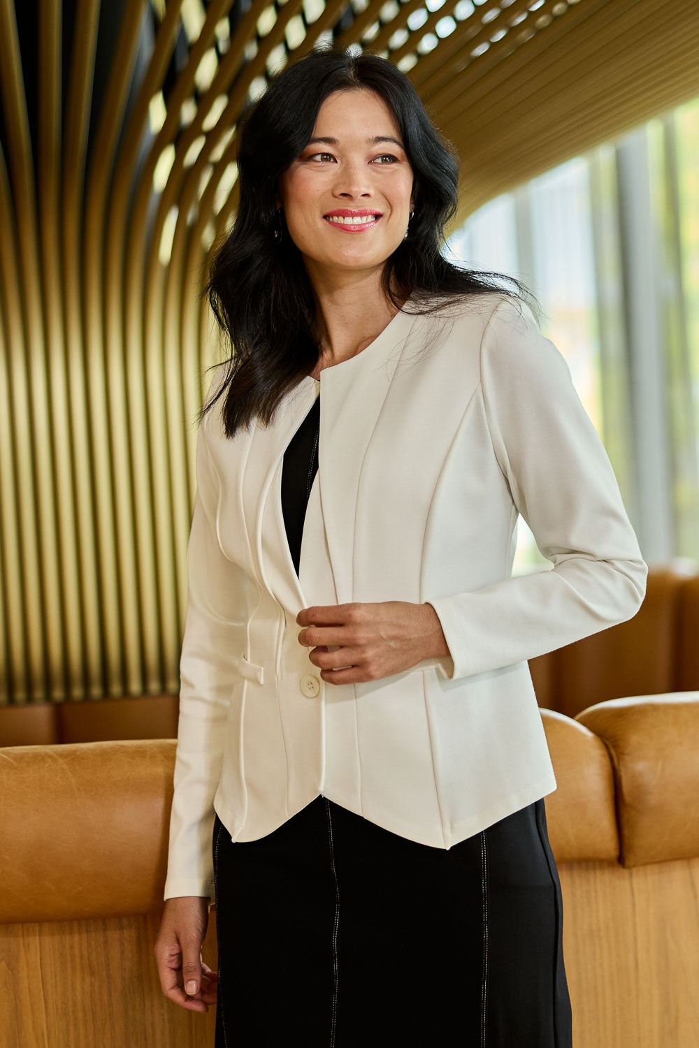 Model Miranda wearing size 10 of The Define Ponte Jacket in colour Pearl (White), from the front, showing the whole outfit
