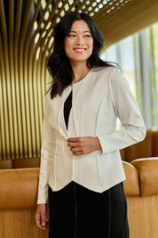 Model Miranda wearing size 10 of The Define Ponte Jacket in colour Pearl (White), from the front, showing the whole outfit