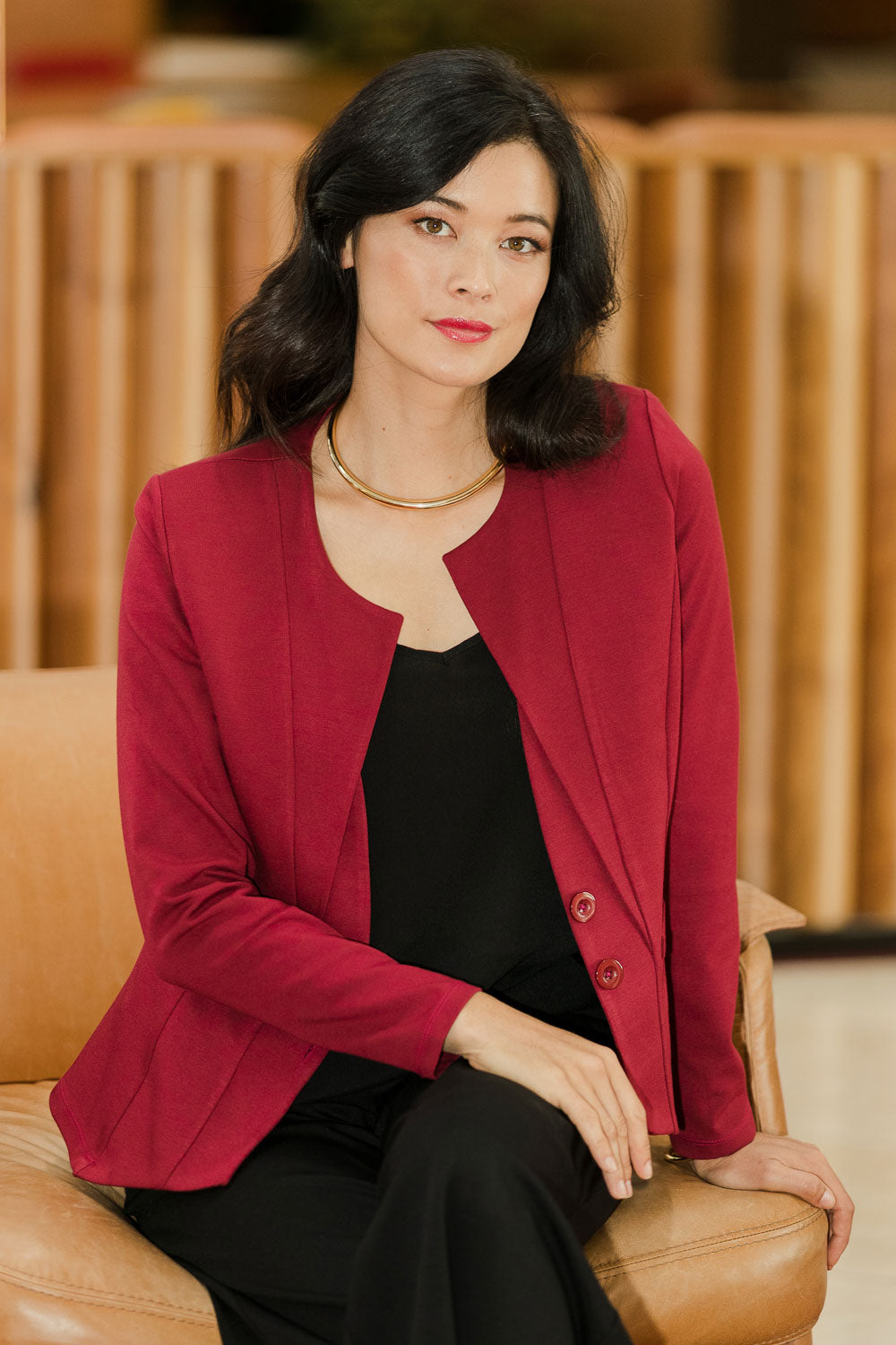 Model Miranda wearing size 10 of The Define Ponte Jacket in colour Port (Red), from the front, showing the whole outfit
