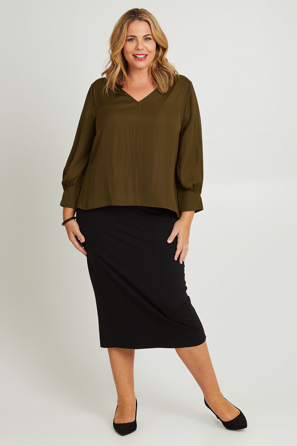 Model Fiona wearing size 16 of The Luxe V Neck Blouse in colour Sepia, from the front, showing the whole outfit