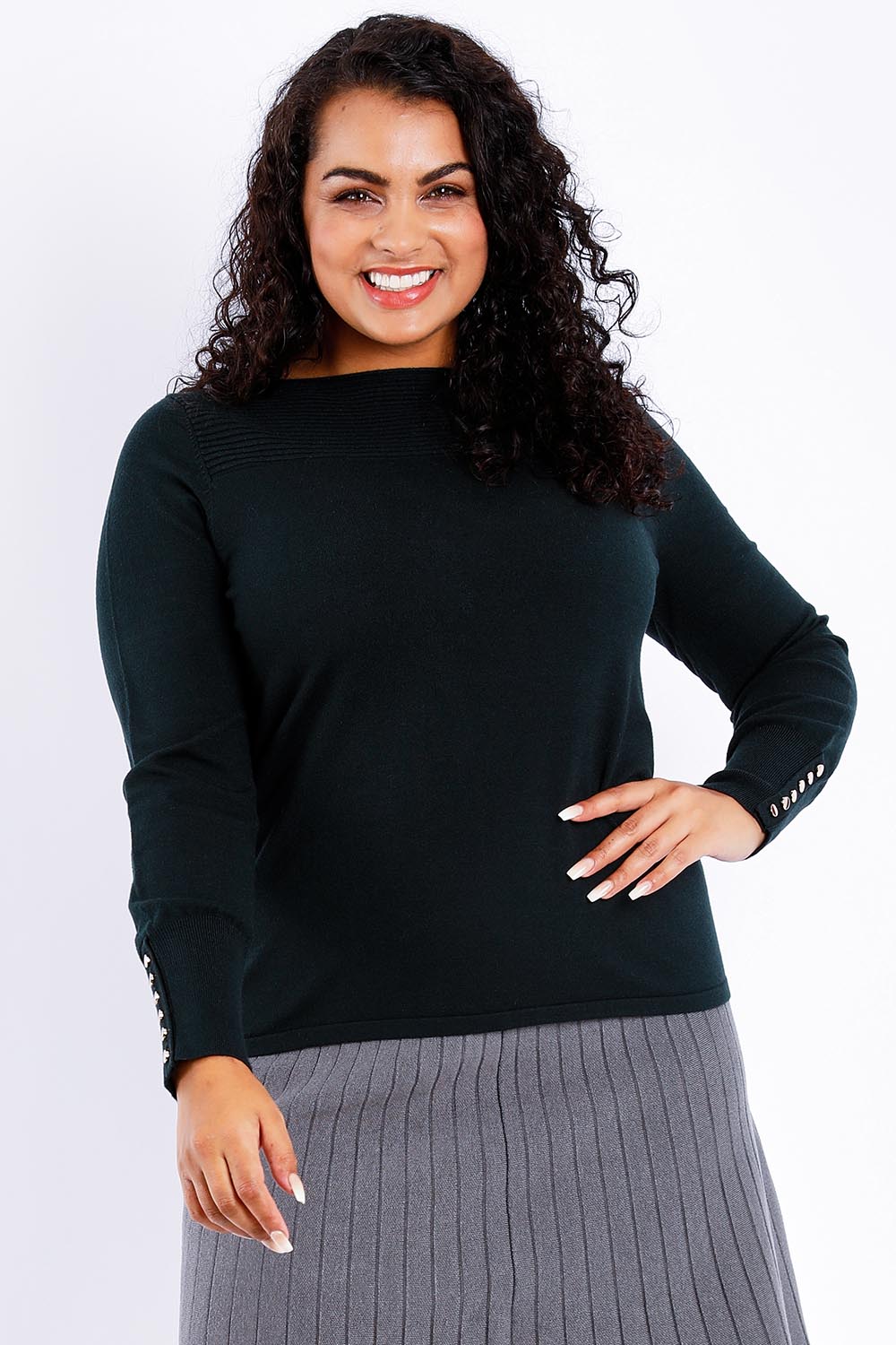 Model Sasha-Lee wearing size XL of The Boat Neck Knit in colour Darkpine (Green), from the front, cropped image