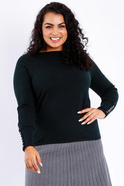 Model Sasha-Lee wearing size XL of The Boat Neck Knit in colour Darkpine (Green), from the front, cropped image