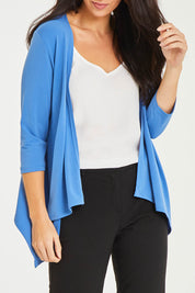 Model Stacey wearing size 10 of The Drape Cardi in colour Denimblue (Blue), from the front, cropped image