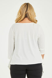Model Katie wearing size 16 of The Drape Cardi in colour Ivory (White), from the back