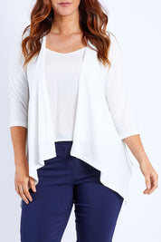 Model Laura wearing size 12 of The Drape Cardi in colour Ivory (White), from the front, cropped image