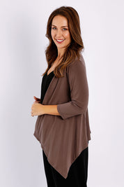 Model Jessica wearing size 14 of The Drape Cardi in colour Mocha, from the front, cropped image