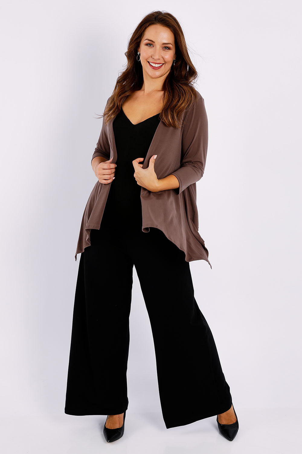 Model Jessica wearing size 14 of The Drape Cardi in colour Mocha, from the front, showing the whole outfit